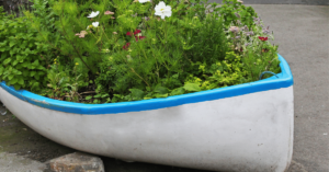 Convert an old boat into a planter box